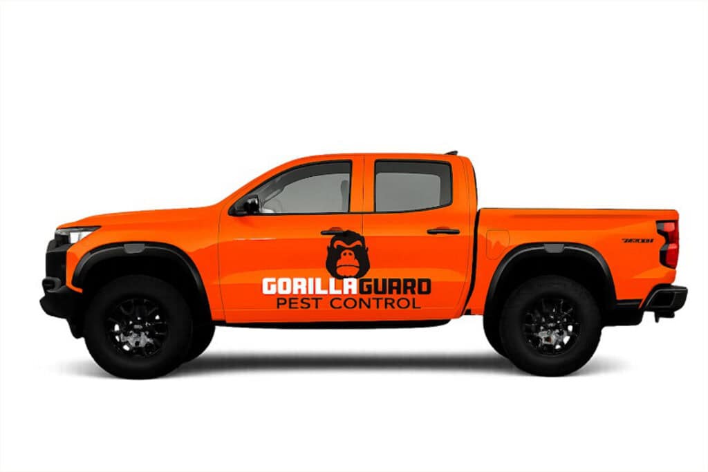 GorillaGuard Pest Control service truck with orange company branding.